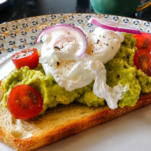Avocado on sourdough with poached eggs, cherry tomatoes and red onion. Ordered more mornings than we'd like to admit.