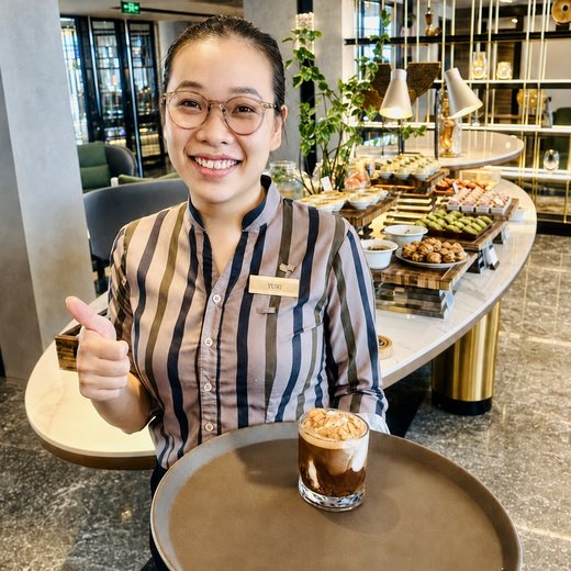 Yuri is always smiling and makes the best iced coconut coffee! She is terrific!