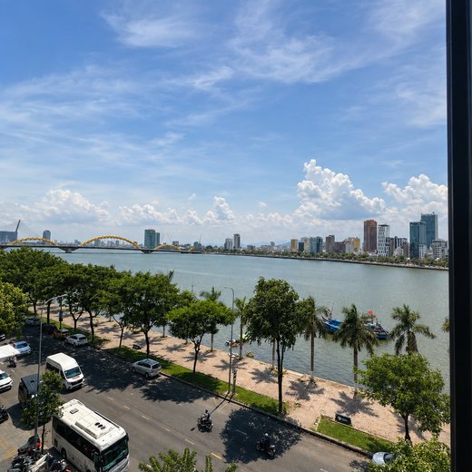 The Han River and Dragon Bridge from inside the hotel, the view that explains the whole location.